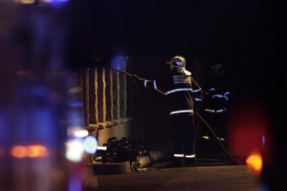 a firefighter works at the site of an explosion in prague january 1 photo reuters