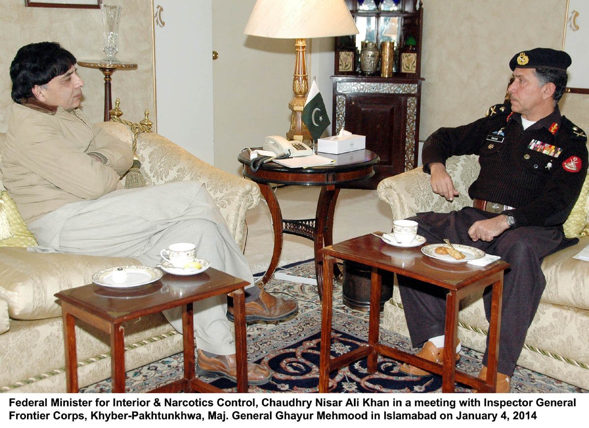 interior minister chaudhry nisar ali khan l and ig fc k p maj gen ghayur mehmood in a meeting on saturday photo pid