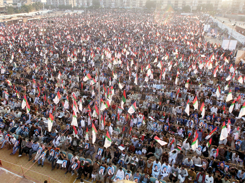 thousands of mqm supporters gathered at the grounds adjacent to aladin park on sunday the rally was part of the mqm s campaign for local government elections photo athar khan express