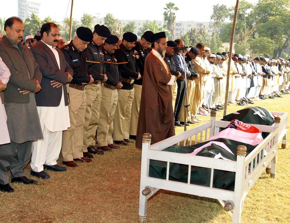 ig shahid baloch and other officials offering funeral prayers over the policemen killed on january 5 2014 photo online