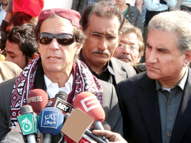 pti chief imran khan flanked by shah mehmood qureshi talks to journalists before the rally photo ppi pti chief imran khan flanked by shah mehmood qureshi talks to journalists before the rally photo ppi