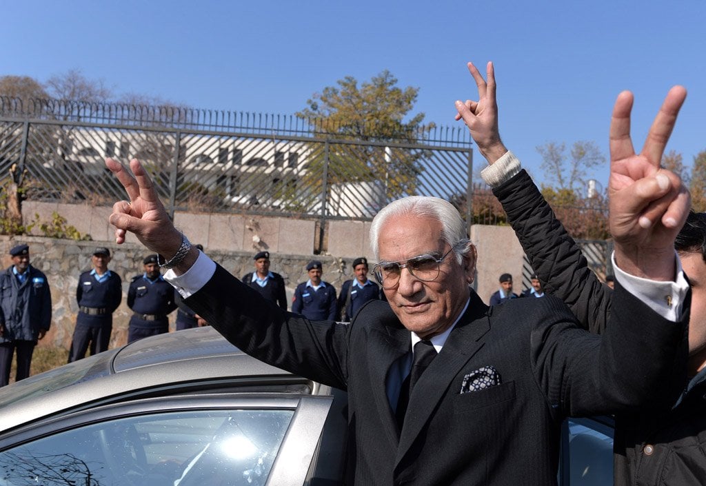 ahmed raza kasuri lawyer of former pakistani military ruler pervez musharraf gestures as he leaves a special court set up to try musharraf after a hearing in islamabad on january 6 2014 photo afp