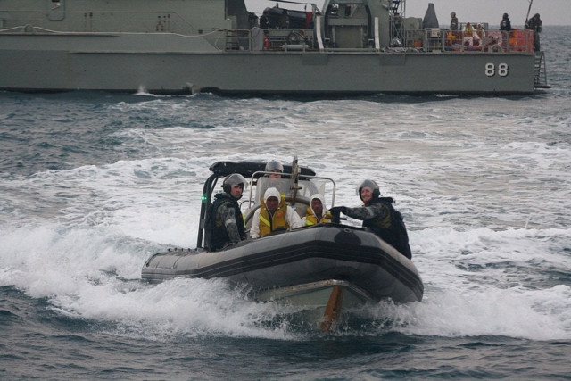 file photo of australian navy personnel transferring asylum seekers to an indonesian rescue boat photo afp file photo of australian navy personnel transferring asylum seekers to an indonesian rescue boat photo afp