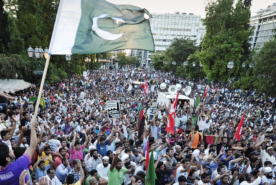 thousands of immigrants to greece mainly from pakistan gather at athens central syntagma square on august 24 2012 during their protest rally against the recent violent attacks on immigrants by ultra nationalist groups and the police operations in order to arrest undocumented immigrants photo afp