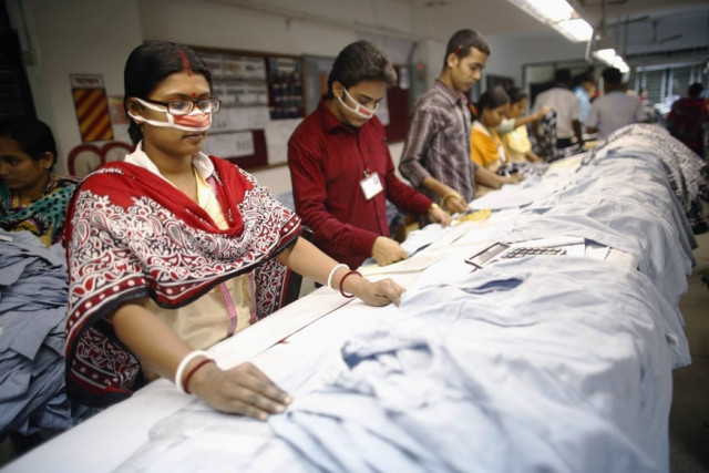 employees work in a factory of babylon garments in dhaka january 3 2014 photo reuters employees work in a factory of babylon garments in dhaka january 3 2014 photo reuters