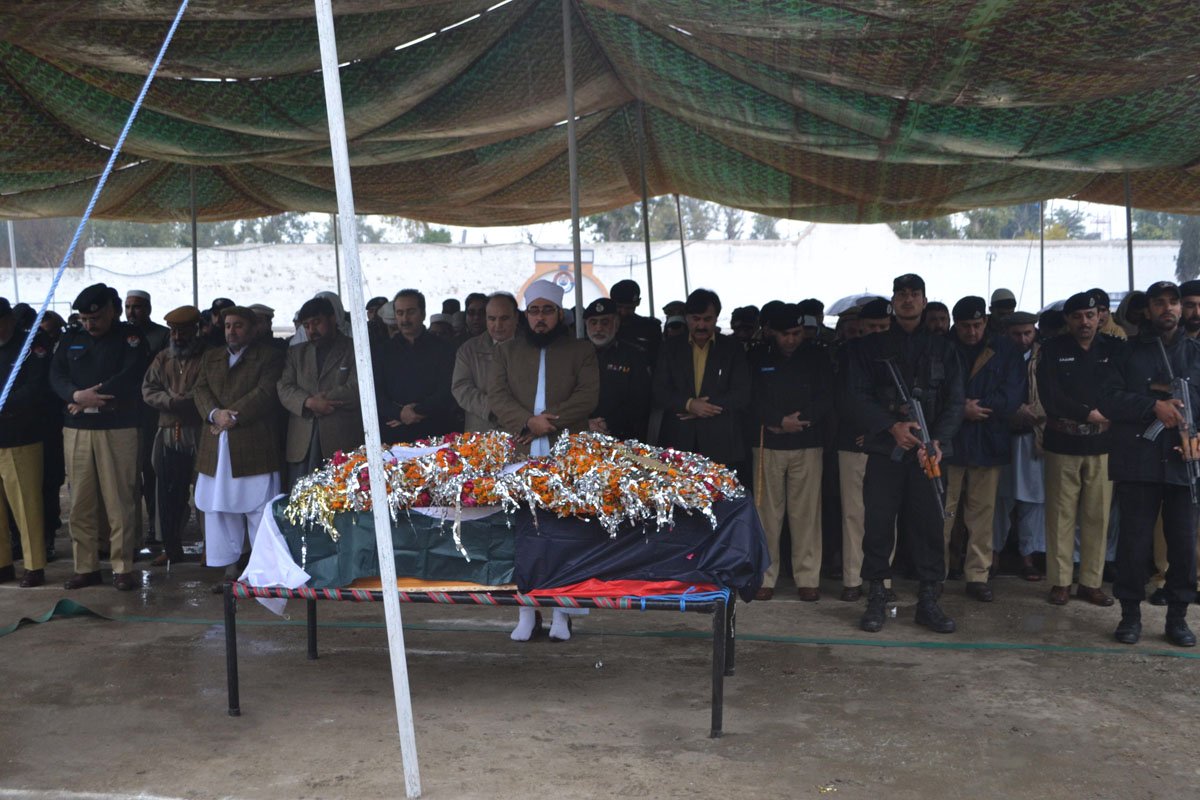 police officials offer funeral prayers for head constable nisar khan who was killed on wednesday in peshawar photo iqbal haider express