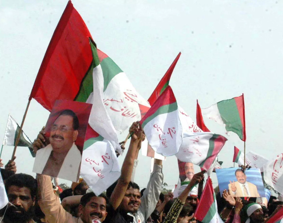 mqm activists with party flags photo ppi mqm activists with party flags photo ppi