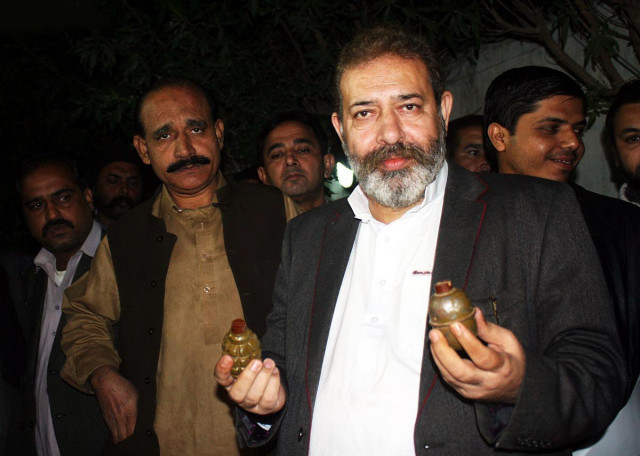 sp cid chaudhry muhammad aslam showing hand grenades recovered from a cid operation against ttp militants on january 21 2013 in karachi photo online sp cid chaudhry muhammad aslam showing hand grenades recovered from a cid operation against ttp militants on january 21 2013 in karachi photo online