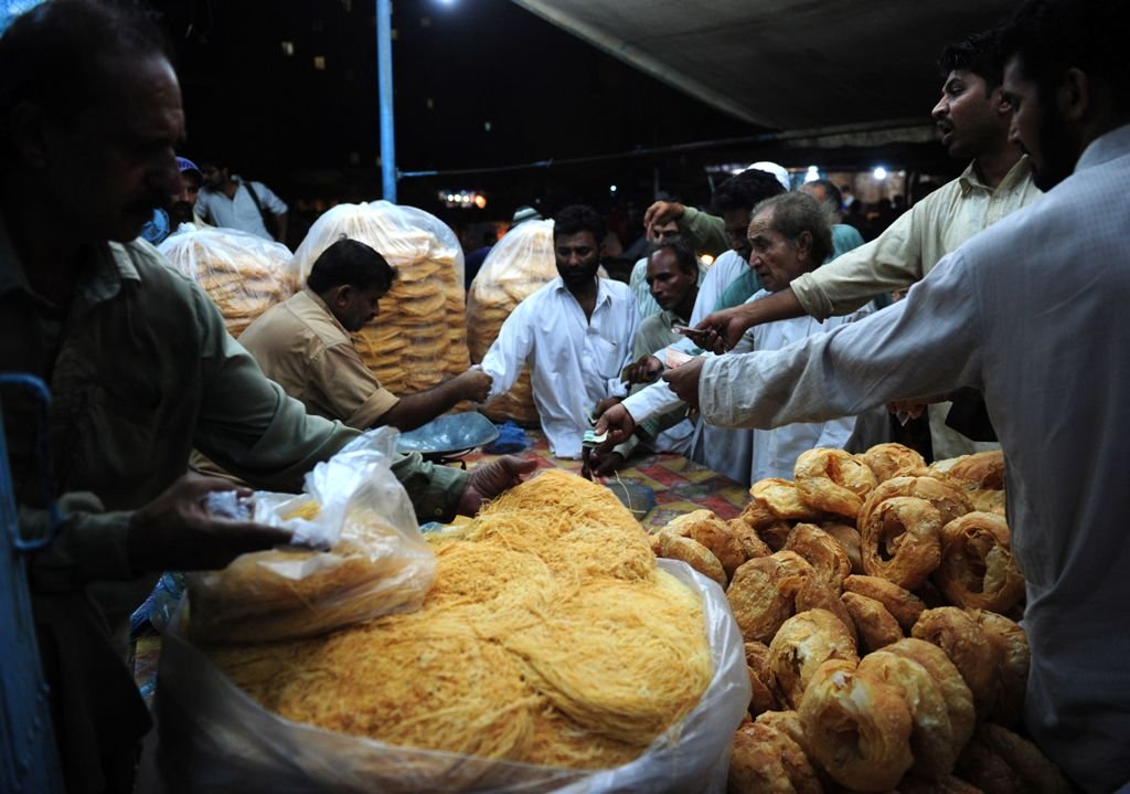 file photo of people buying food photo afp