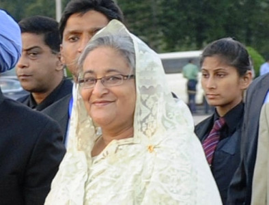 amid protests hasina invited to form government