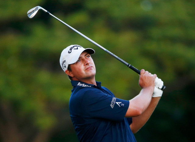 brian stuard plays a shot on the 15th hole during the second round of the sony open in hawaii at waialae country club on january 10 2014 in honolulu hawaii photo afp brian stuard plays a shot on the 15th hole during the second round of the sony open in hawaii at waialae country club on january 10 2014 in honolulu hawaii photo afp