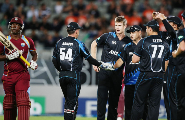 black caps wicket keeper luke ronchi 2nd l and bowler jimmy neesham celebrate a wicket with the team as west indies batsman johnson charles l photo afp black caps wicket keeper luke ronchi 2nd l and bowler jimmy neesham celebrate a wicket with the team as west indies batsman johnson charles l photo afp