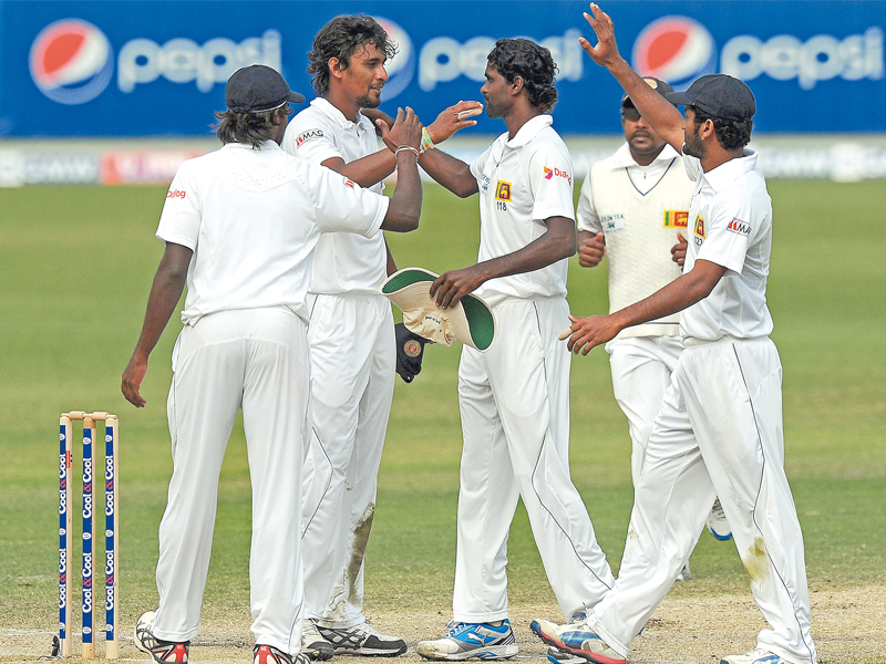 sri lanka produced a professional performance to register their biggest victory over pakistan by nine wickets in the second test in dubai taking a 1 0 lead in the three match series photo afp