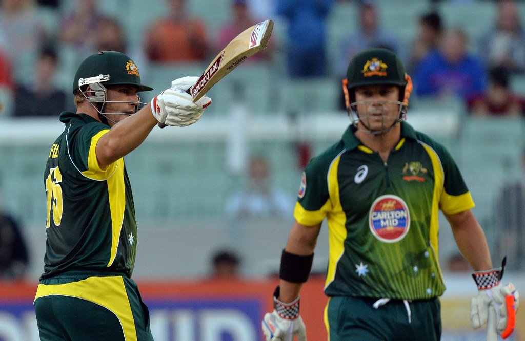 australia 039 s batsman aaron finch l celebrates scoring half century against england next to team mate david warner r during the first one day international cricket match of the series between australia and england in melbourne on january 12 2014 photo afp