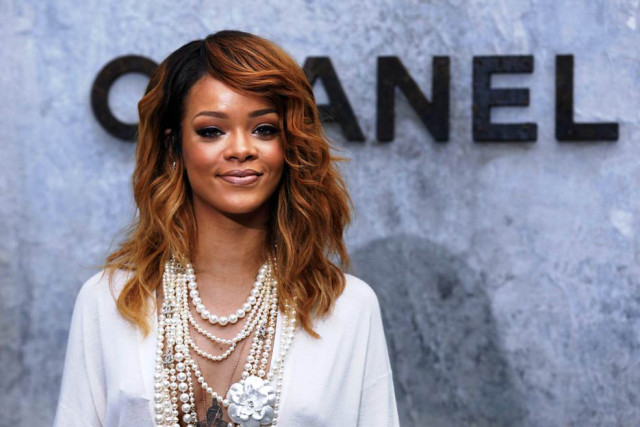 rihanna poses during a photocall prior to the chanel haute couture fall winter 2013 2014 collection shows on july 2 2013 at the grand palais in paris photo afp rihanna poses during a photocall prior to the chanel haute couture fall winter 2013 2014 collection shows on july 2 2013 at the grand palais in paris photo afp