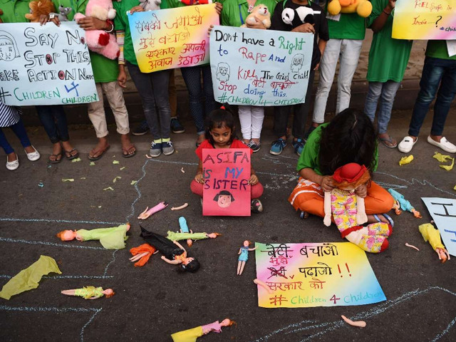 indian demonstrators hold placards during a silent protest 039 not in my name 039 in support of rape victims following high profile cases in jammu and kashmir and uttar pradesh states in new delhi on april 15 2018 photo afp indian demonstrators hold placards during a silent protest 039 not in my name 039 in support of rape victims following high profile cases in jammu and kashmir and uttar pradesh states in new delhi on april 15 2018 photo afp