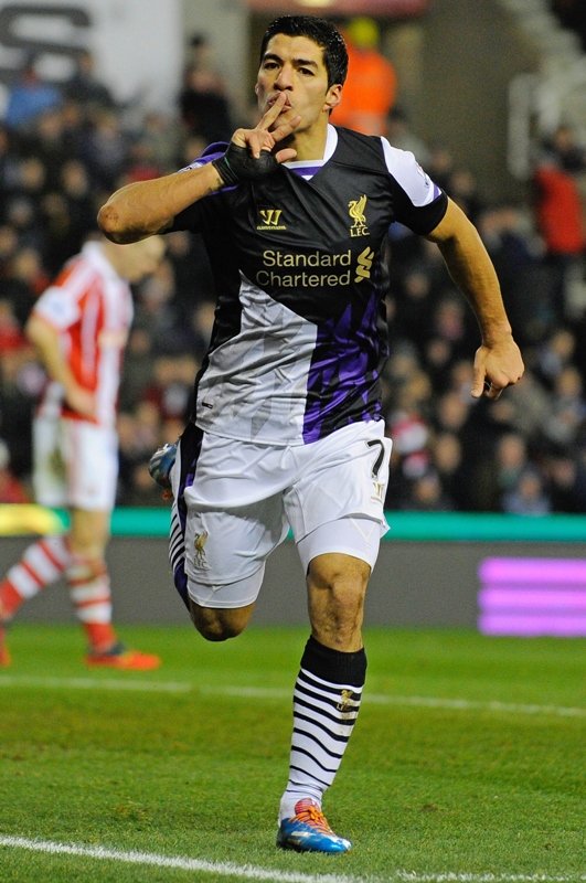 unplayable luiz suarez scored a brace against stoke to take his tally to 22 goals from 16 games in the premier league to become a favourite for winning the golden boot photo afp