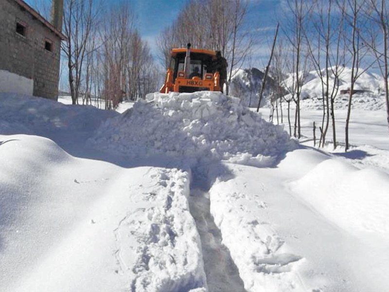 a pakistan army engineering team removes snow from the road near lowari tunnel in chitral photo online