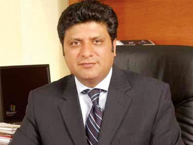 former chairman tariq malik photo file