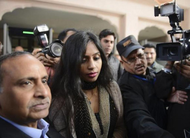 indian diplomat devyani khobragade c leaves with her father uttam khobragade l from the maharashtra sadan state guesthouse to meet india 039 s foreign minister salman khurshid in new delhi january 11 2014 photo reuters indian diplomat devyani khobragade c leaves with her father uttam khobragade l from the maharashtra sadan state guesthouse to meet india 039 s foreign minister salman khurshid in new delhi january 11 2014 photo reuters