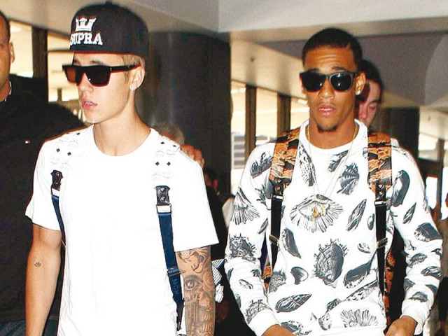 the aspiring rapper lil za as pictured here with bieber was arrested from the latter s california home photo file the aspiring rapper lil za as pictured here with bieber was arrested from the latter s california home photo file