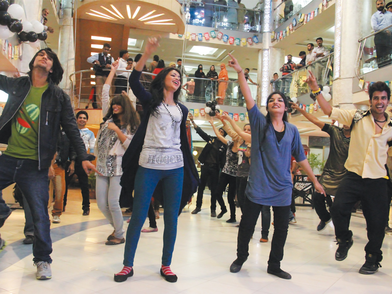 a flash mob sends an anti piracy message through their moves as they dazzle the crowd at park towers on friday photo ayesha mir express