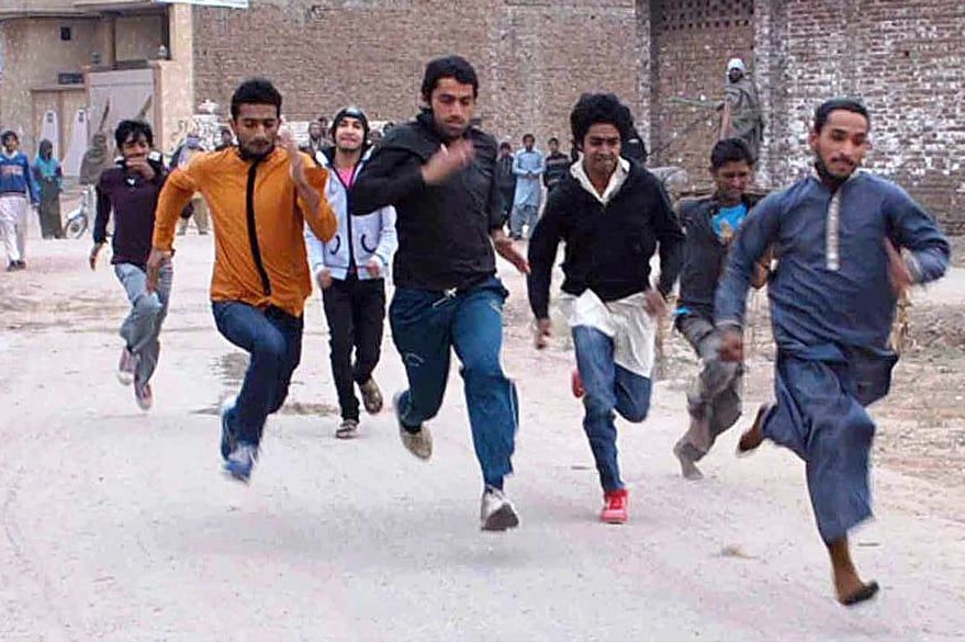 players participating in 200 meters race competition during punjab youth sports festival in multan photo app