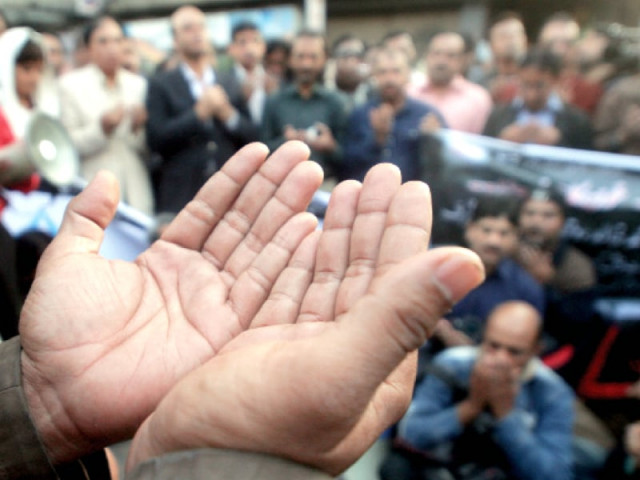 protesters pray for the three express news staff members who lost their lives on january 17 the killings sparked demonstrations throughout the province photo athar khan express protesters pray for the three express news staff members who lost their lives on january 17 the killings sparked demonstrations throughout the province photo athar khan express