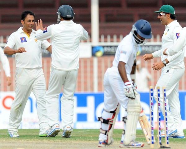 abdur rehman bowls off kaushal silva during fourth day 039 s play photo afp abdur rehman bowls off kaushal silva during fourth day 039 s play photo afp