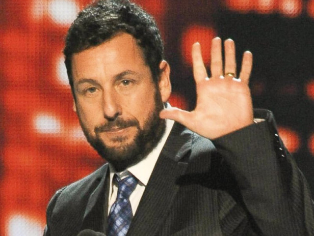 sandler accepts the favorite comedic movie actor award onstage at the 40th annual people s choice awards photo file sandler accepts the favorite comedic movie actor award onstage at the 40th annual people s choice awards photo file