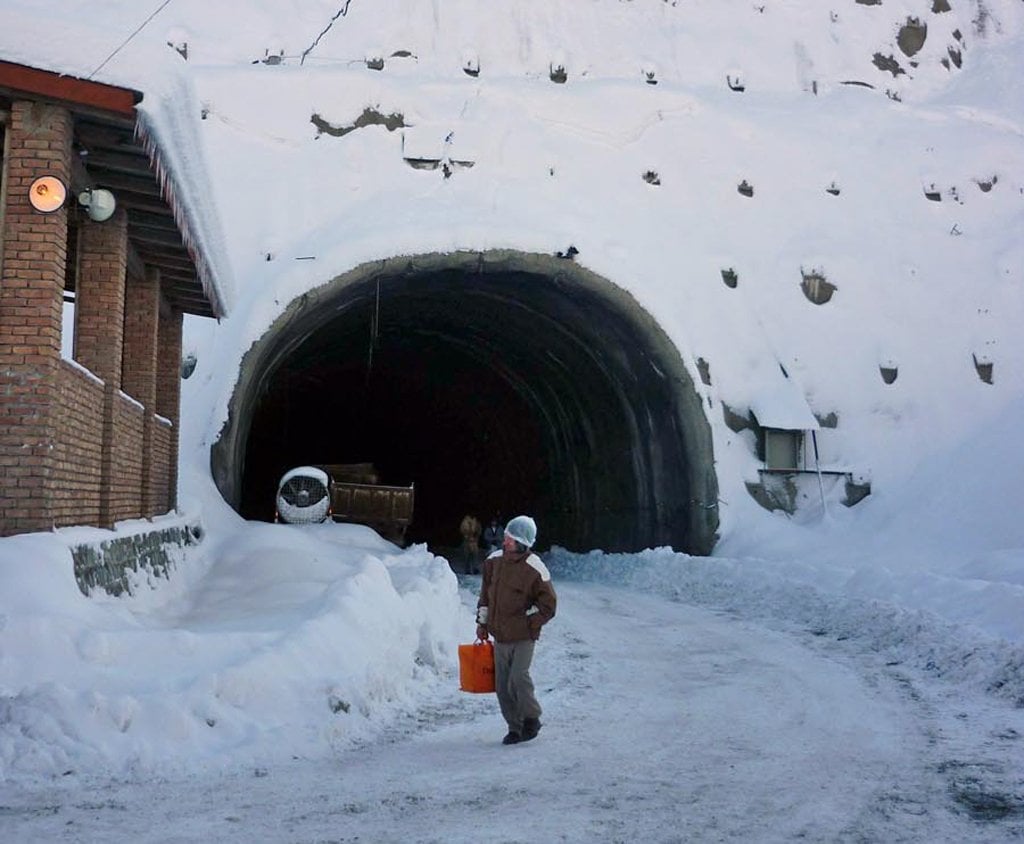 despite the deployment of heavy machinery by the army the snowfall is so great that they are unable to keep the approaches to the tunnel open photo online file