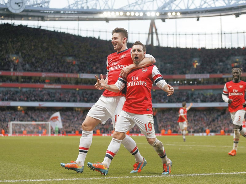 santi cazorla linked superbly with jack wilshere and olivier giroud to put arsenal ahead in the 57th minute before pouncing on a weak clearance five minutes later to rifle home the second photo afp