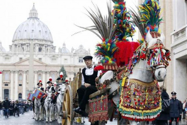 a traditional sicilian chariot with a horse is seen in saint peter 039 s square at the vatican january 17 2014 photo reuters a traditional sicilian chariot with a horse is seen in saint peter 039 s square at the vatican january 17 2014 photo reuters