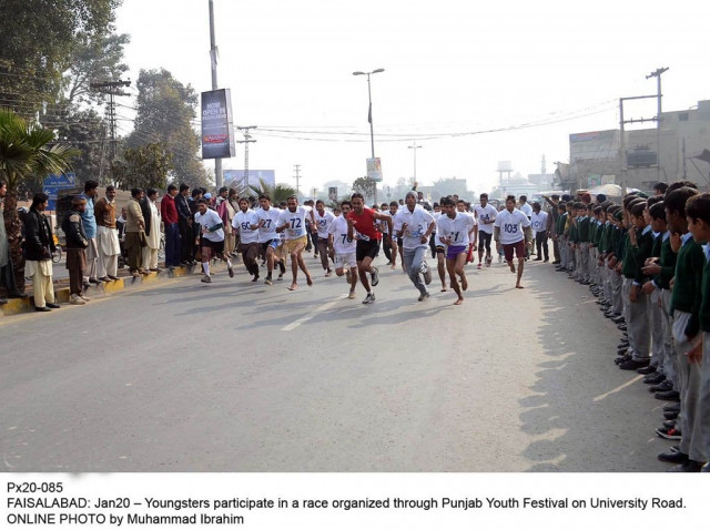 youngsters participate in a race organized in faisalabad during the punjab youth festival photo online youngsters participate in a race organized in faisalabad during the punjab youth festival photo online