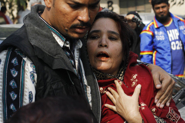 relatives of a female polio vaccination worker mourn outside a morgue in the jinnah post graduate medical center photo reuters relatives of a female polio vaccination worker mourn outside a morgue in the jinnah post graduate medical center photo reuters