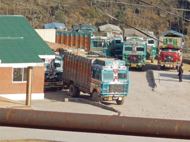 indian goods trucks parked outside the office of tata in chokothi sector ajk along the line of control