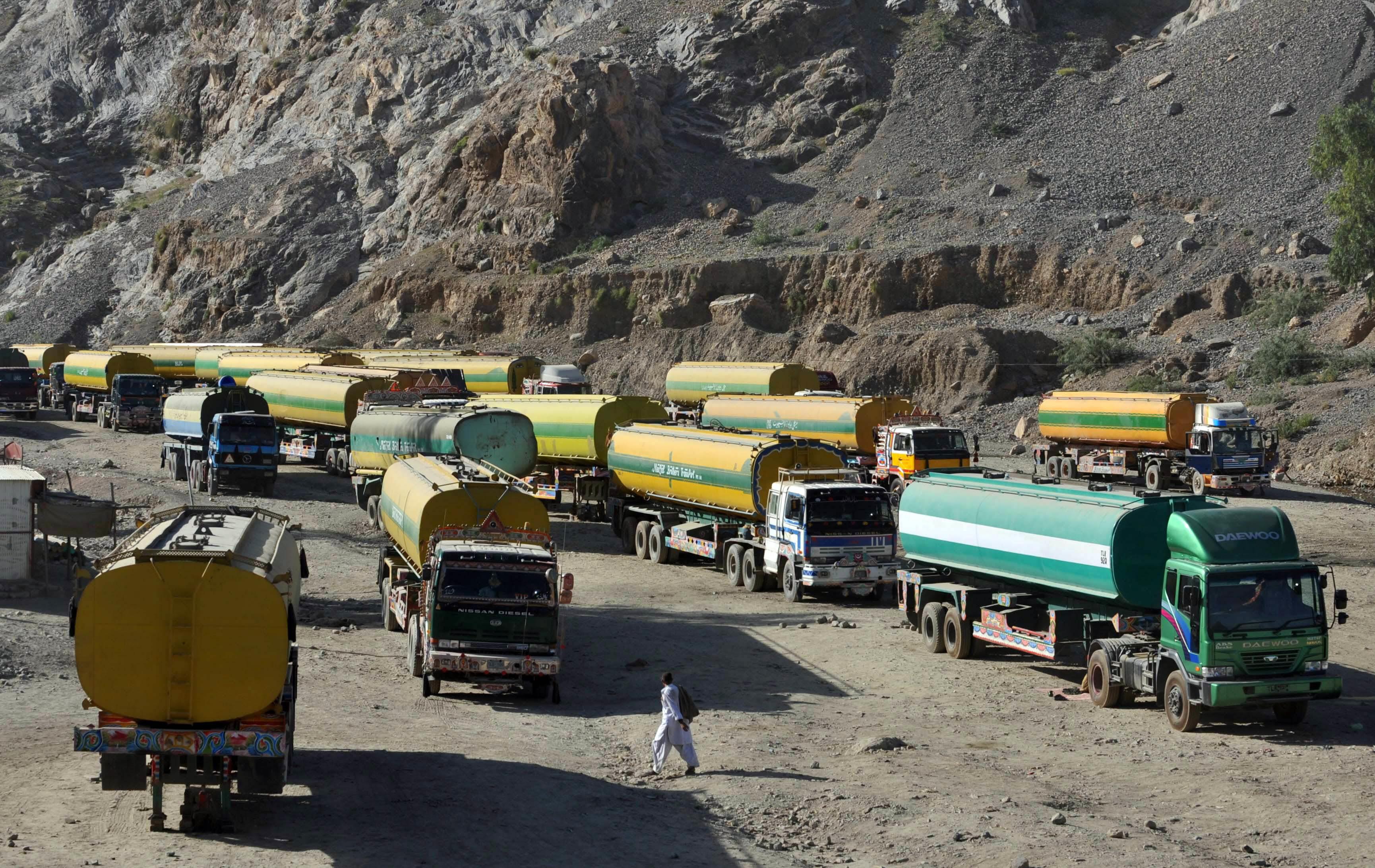 on monday morning six more containers were allowed to leave for karachi from khyber agency photo afp file