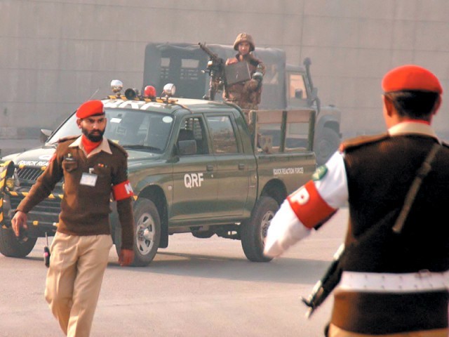 pakistan army troops arrive at the site of the suicide blast photo nni