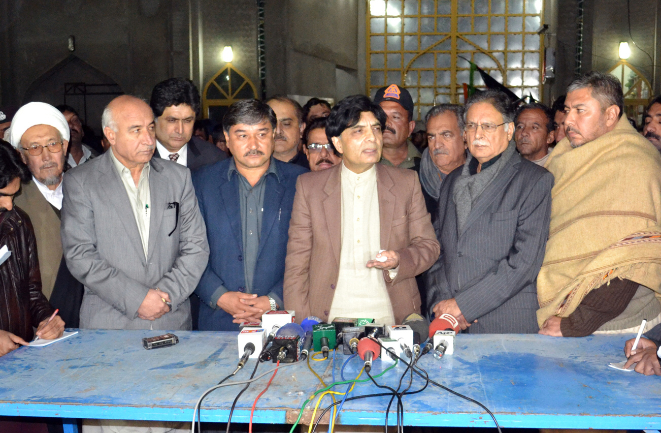 interior minister chaudhry nisar c speaks after meeting with representatives of the hazara community in quetta flanked by minister for information pervez rashid 2ndr and balochistan chief minister abdul malik 1st l photo banaras khan express