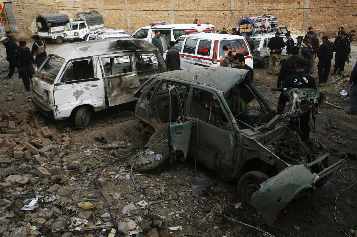 the site of the bomb blast in peshawar on thursday photo reuters