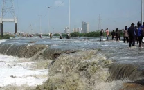 gold rush fever grips karachi as crowds dig along malir river gold rush fever grips karachi as crowds dig along malir river
