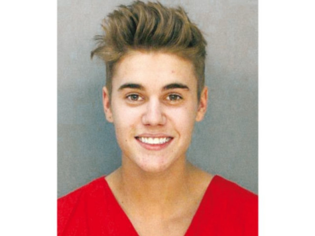the pop star smiled for the police mug shot post arrest photo file the pop star smiled for the police mug shot post arrest photo file