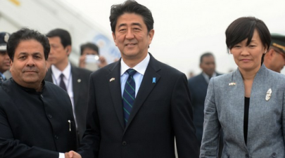 japan pm lands in india to push closer ties