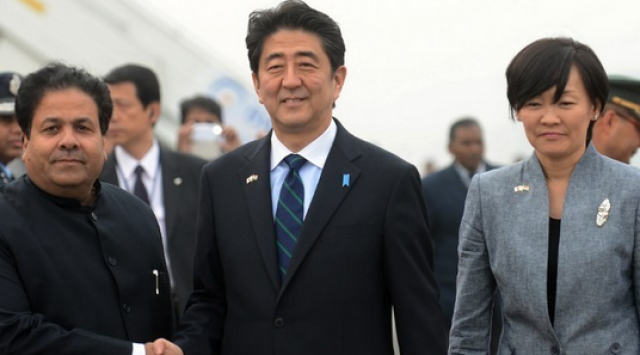 japanese prime minister shinzo abe shakes hands with indian minister of state for parliamentary affairs rajeev shukla in new delhi photo afp japanese prime minister shinzo abe shakes hands with indian minister of state for parliamentary affairs rajeev shukla in new delhi photo afp