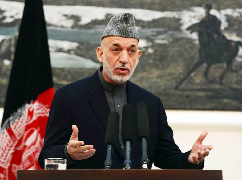 afghan president hamid karzai addresses a press conference at the presidential palace in kabul on november 16 2013 photo afp