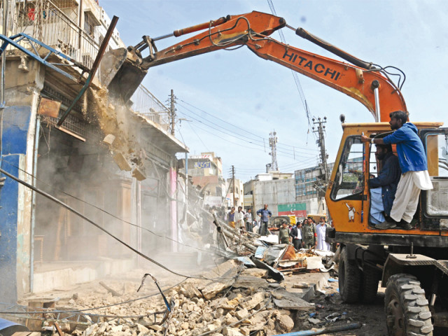 cbc officials razed illegal shops at delhi colony on saturday photo mohammad azeem express cbc officials razed illegal shops at delhi colony on saturday photo mohammad azeem express