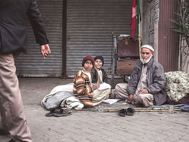 homeless and cornered ali and imdaad look to benevolent passersby for means of subsistence photo myra iqbal express homeless and cornered ali and imdaad look to benevolent passersby for means of subsistence photo myra iqbal express