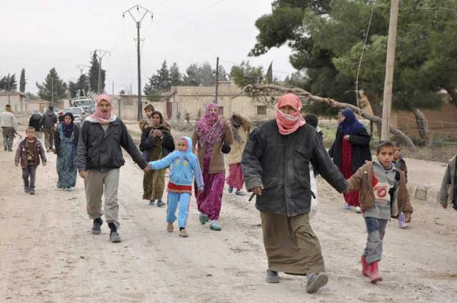 residents walk back to their homes in al menajir village after kurdish people 039 s protection units ypg took control of it activists said in ras al ain countryside january 26 2014 photo reuters residents walk back to their homes in al menajir village after kurdish people 039 s protection units ypg took control of it activists said in ras al ain countryside january 26 2014 photo reuters