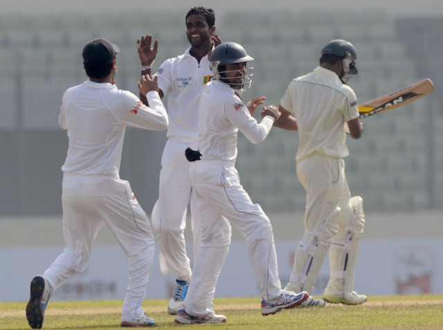 shaminda eranga c finished with four for 49 photo afp shaminda eranga c finished with four for 49 photo afp