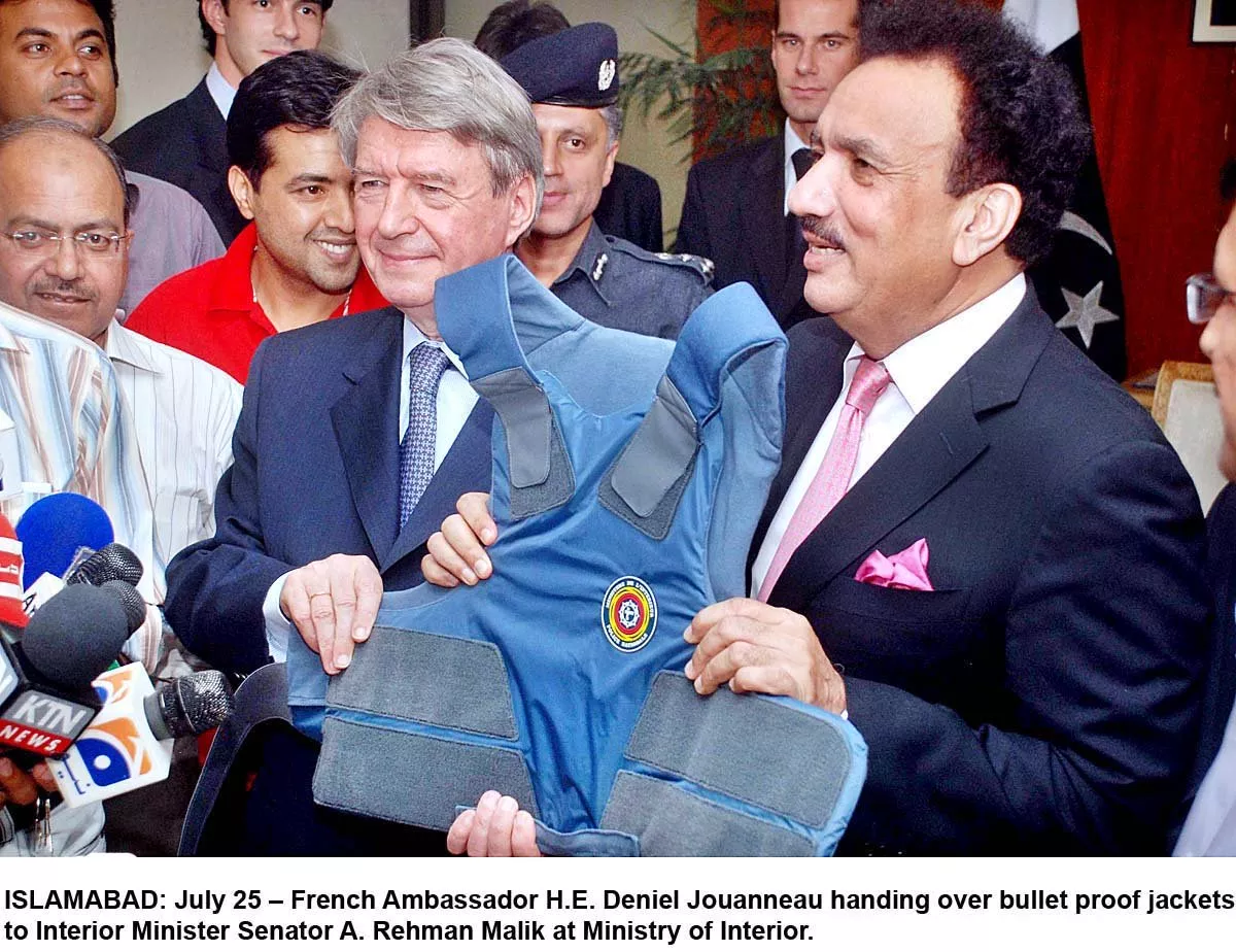 french ambassador deniel jouanneau handing over bullet proof jackets to the then minister of interior rehman malik photo pid file french ambassador deniel jouanneau handing over bullet proof jackets to the then minister of interior rehman malik photo pid file